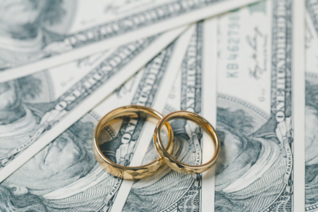 money and gold wedding bands
